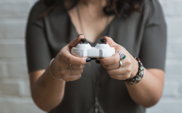 woman holding video game controller